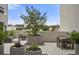Open-air patio featuring elegant planters, and furniture at 1898 S Bannock St # 510, Denver, CO 80223