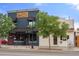 Charming commercial building with eye-catching signage and a lively street presence at 1898 S Bannock St # 510, Denver, CO 80223