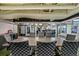 Spacious conference room with modern table and chairs, and wet bar on the side at 2000 Arapahoe St # 1, Denver, CO 80205
