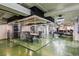 Bright conference room with a glass enclosure, table, and chairs, ideal for meetings at 2000 Arapahoe St # 1, Denver, CO 80205