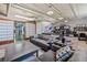 Cozy living room featuring comfortable seating, a stylish rug, and plenty of natural light at 2000 Arapahoe St # 1, Denver, CO 80205