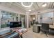 Office space featuring multiple work stations, modern lighting, and recreational amenities at 2000 Arapahoe St # 1, Denver, CO 80205