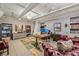 Office space with multiple work stations, seating, and decorative rug at 2000 Arapahoe St # 1, Denver, CO 80205