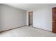 Neutral bedroom features plush carpeting and light-colored walls at 3951 S Carson St # D, Aurora, CO 80014