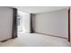 This bedroom features a large window for plenty of natural light at 3951 S Carson St # D, Aurora, CO 80014