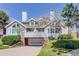 Charming two-story townhome with garage, brick accents, and well-maintained landscaping at 3951 S Carson St # D, Aurora, CO 80014