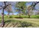 Scenic view of the golf course. Green grass and shade trees on a sunny day at 3951 S Carson St # D, Aurora, CO 80014