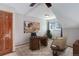 Bright home office with stylish desk, neutral decor, and window views at 3951 S Carson St # D, Aurora, CO 80014