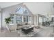Bright and airy living room with soaring windows and open floor plan at 3951 S Carson St # D, Aurora, CO 80014