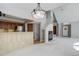 Bright living room boasts an open floor plan, fireplace, and staircase nearby at 3951 S Carson St # D, Aurora, CO 80014