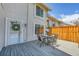 Cozy deck with outdoor seating perfect for entertaining or relaxing, complete with stylish furniture at 7077 S Knolls Way, Centennial, CO 80122