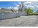 Row of garages with individual doors, providing secure parking at 7077 S Knolls Way, Centennial, CO 80122