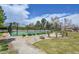 Well-maintained community tennis courts surrounded by lush landscaping at 7077 S Knolls Way, Centennial, CO 80122