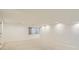 Spacious basement area with neutral carpet, recessed lighting, and natural light at 10000 E Yale Ave # 58, Denver, CO 80231