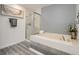 A luxurious bathroom featuring a soaking tub and a separate shower at 10000 E Yale Ave # 58, Denver, CO 80231