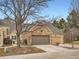 Charming townhome with a stone front and a two-car garage at 10000 E Yale Ave # 58, Denver, CO 80231