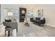 Stylish living room with a modern fireplace, neutral decor, and an open layout perfect for entertaining at 10000 E Yale Ave # 58, Denver, CO 80231