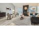 Bright living room with modern decor, a sleek fireplace, and an inviting atmosphere at 10000 E Yale Ave # 58, Denver, CO 80231