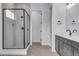 A primary bathroom featuring tiled glass shower and vanity at 24741 E 33Rd Dr, Aurora, CO 80019