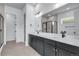 A primary bathroom features double sink vanity and shower at 24741 E 33Rd Dr, Aurora, CO 80019