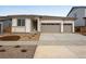 Attractive one-story house with a three-car garage, complemented by stone and siding accents at 24741 E 33Rd Dr, Aurora, CO 80019