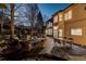 Stunning backyard featuring a spacious wooden deck, an outdoor dining set, and comfortable seating area at 2464 Ginny Way, Lafayette, CO 80026