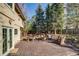 Spacious deck with outdoor seating and mature trees; perfect for entertaining guests at 2464 Ginny Way, Lafayette, CO 80026