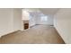 This unfurnished basement has a fireplace and plenty of room for storage or activities at 2464 Ginny Way, Lafayette, CO 80026