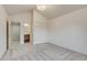 This bedroom has neutral decor and connects to an ensuite bathroom at 2464 Ginny Way, Lafayette, CO 80026