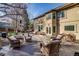 Spacious outdoor deck with comfortable seating, perfect for enjoying warm days and outdoor dining at 2464 Ginny Way, Lafayette, CO 80026