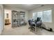 Home office with window, carpet, and access to en-suite bathroom at 2464 Ginny Way, Lafayette, CO 80026