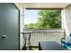 Balcony area with outdoor seating and privacy lattice at 7780 W 38Th Ave # 203, Wheat Ridge, CO 80033
