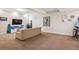 Finished basement featuring a sofa, TV, and carpet floors at 327 Ingleton Ct, Castle Pines, CO 80108