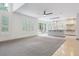 Bright and airy living room with hardwood floors and large windows at 327 Ingleton Ct, Castle Pines, CO 80108