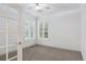 Neutral toned office space with carpet and light colored walls and trim at 327 Ingleton Ct, Castle Pines, CO 80108
