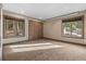 Bedroom with two windows providing great natural light and a built in wardrobe at 7845 Armadillo Trl, Evergreen, CO 80439