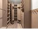 Organized walk-in closet features custom shelving and ample storage space at 7845 Armadillo Trl, Evergreen, CO 80439
