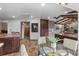 Open-concept kitchen eating area and easy access to kitchen at 7845 Armadillo Trl, Evergreen, CO 80439