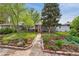 Charming single-story home with a landscaped front yard and a welcoming red front door at 1343 Gay St, Longmont, CO 80501