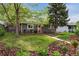 Inviting single-story home featuring a small front porch and lush green lawn at 1343 Gay St, Longmont, CO 80501