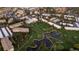 Community overview: golf course, ponds, and buildings at 665 S Alton Way # 6D, Denver, CO 80247