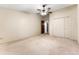 Spacious bedroom with carpet and double-door closet at 665 S Alton Way # 6D, Denver, CO 80247