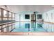 Indoor swimming pool with large windows at 665 S Alton Way # 6D, Denver, CO 80247