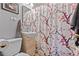 Bathroom featuring a floral shower curtain, modern vanity, and neutral wall color at 661 Tennyson St, Denver, CO 80204