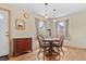 Comfortable dining room with hardwood floors, natural light, and traditional furnishings at 661 Tennyson St, Denver, CO 80204