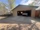 Open garage with a pickup truck parked inside at 661 Tennyson St, Denver, CO 80204