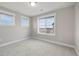 Bedroom bathed in natural light featuring big windows with exterior views at 5471 W 97Th Pl # F, Broomfield, CO 80020