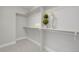 Walk-in closet with built-in shelving, providing ample storage space at 5471 W 97Th Pl # F, Westminster, CO 80020