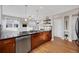 Modern kitchen featuring stainless steel appliances and rich hardwood cabinets at 5471 W 97Th Pl # F, Broomfield, CO 80020