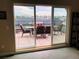 Step out from this sliding door onto your patio to the outdoor dining and lounging area with stylish seating at 5471 W 97Th Pl # F, Broomfield, CO 80020